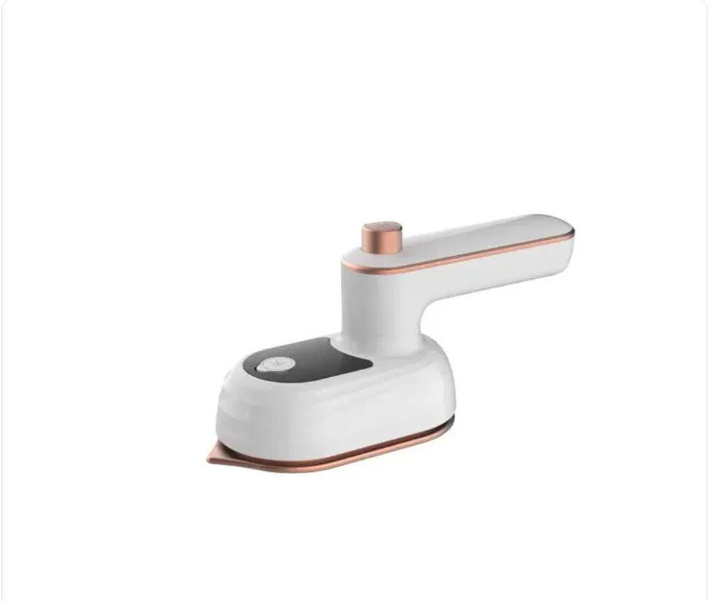 Handheld garment steamer in white with copper accents on a white background