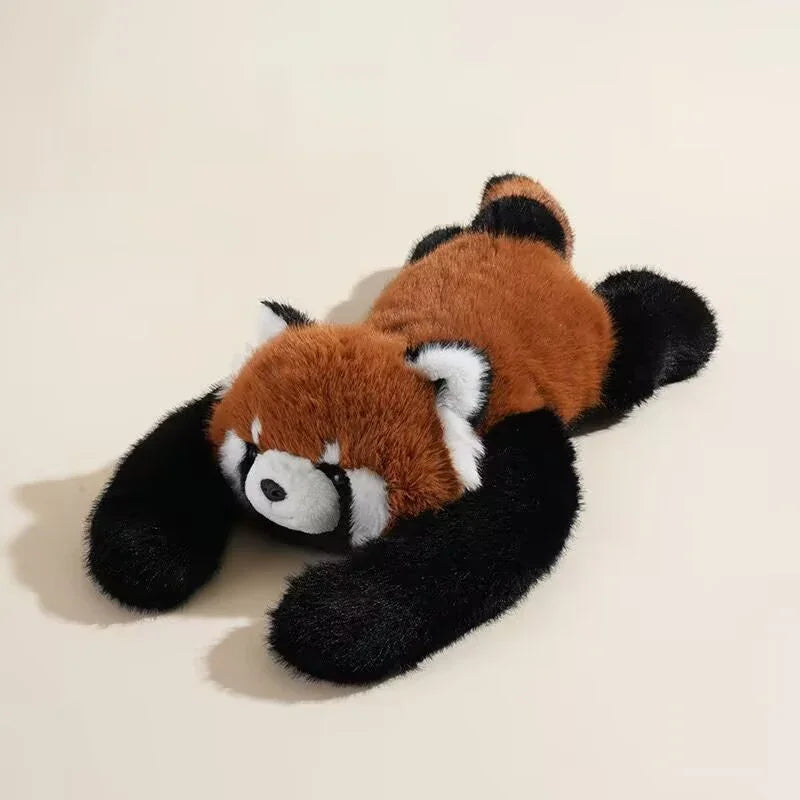 Plush red panda stuffed animal toy lying on cream background, soft and cuddly decor gift