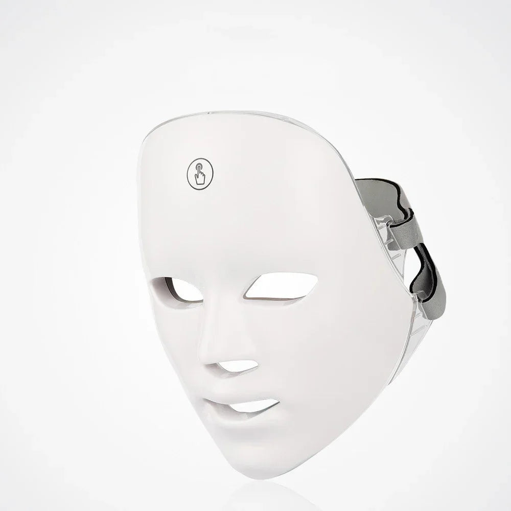 White LED light therapy face mask with strap for skincare treatments
