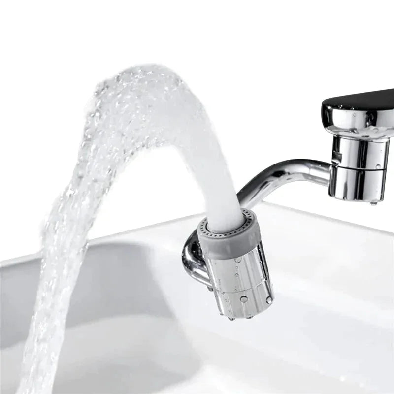 Adjustable faucet sprayer attachment with angled water flow in a kitchen sink
